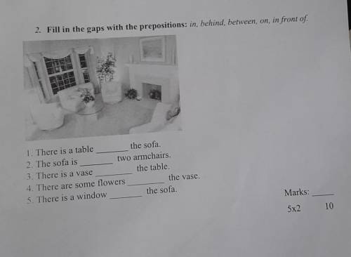 2. Fill in the gaps with the prepositions: in, behind, between, on, in front of There is a tablethe