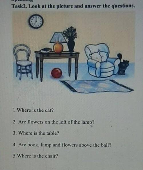 Speaking Task2. Look at the picture and answer the questions.1. Where is the cat?2. Are flowers on t